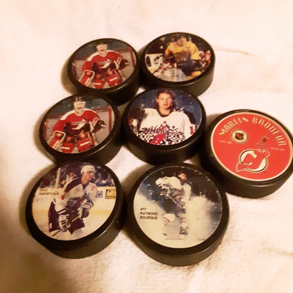 8 hockey pucks